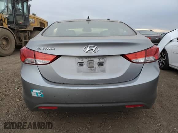 2012 Hyundai Elantra GLS z VIN KMHDH4AE7CU412937, wystawiony jako Copart lot #86394634 z przebiegiem 141 967 mil mil oraz Szkoda całkowita • Salvage title. Historia ofert i sprzedaży dostępna na DreamBid. Obrazek 6.