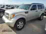 2009 Dodge Nitro SE z VIN 1D8GT28K29W504908, wystawiony jako Copart lot #75272154 z przebiegiem 156 571 mil mil oraz Szkoda całkowita • Salvage title. Historia ofert i sprzedaży dostępna na DreamBid. Obrazek 1.