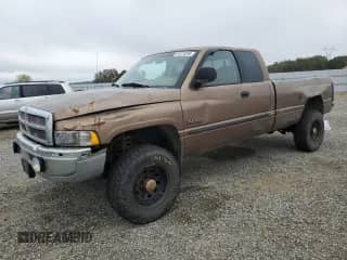 2001 Dodge 2500 with VIN 1B7KF23631J529098, listed as a Copart auction lot 81674595 with 400,626 mi miles and Salvage title. Bid and sale history available at DreamBid. Image 1.