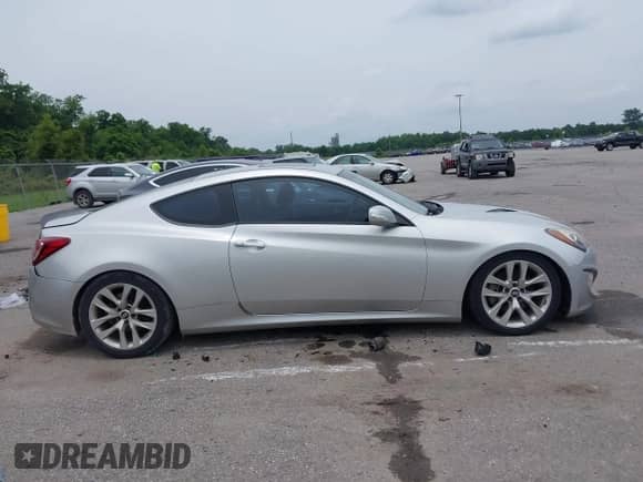 2013 Hyundai Genesis Coupe Grand Touring with VIN KMHHU6KJ8DU087026, listed as a IAAI auction lot 42358356 with 65,730 mi miles and . Bid and sale history available at DreamBid. Image 13.