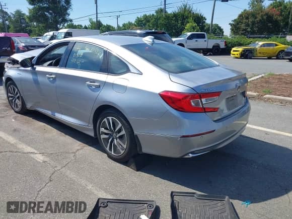 2021 Honda Accord EX-L with VIN 1HGCV3F57MA013218, listed as a IAAI auction lot 42657411 with 163,965 mi miles and . Bid and sale history available at DreamBid. Image 3.