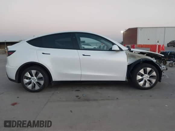 2023 Tesla Model Y Long Range with VIN 7SAYGDEE8PA147396, listed as a IAAI auction lot 43437271 with 24,608 mi miles and . Bid and sale history available at DreamBid. Image 13.