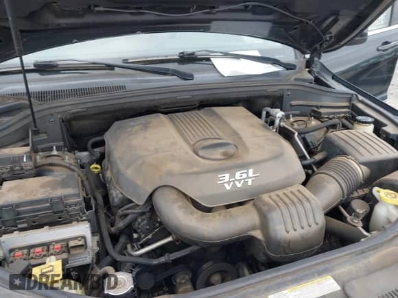 2012 Jeep Grand Cherokee Laredo z VIN 1C4RJEAG1CC229237, wystawiony jako IAAI lot #41613422 z przebiegiem 206 633 mil mil oraz . Historia ofert i sprzedaży dostępna na DreamBid. Obrazek 10.