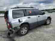 2002 Subaru Forester L with VIN JF1SF63582H711084, listed as a Copart auction lot 56829185 with 168,709 mi miles and Salvage title. Bid and sale history available at DreamBid. Image 3.