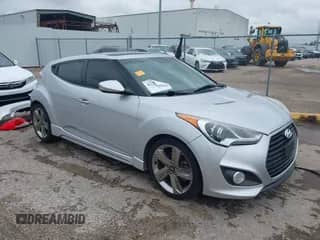 2013 Hyundai Veloster Turbo с VIN KMHTC6AE2DU122273, выставлен на аукционе IAAI как лот 42174272 с пробегом 157 152 миль миль и . История ставок и продаж доступна на DreamBid. Изображение 1.