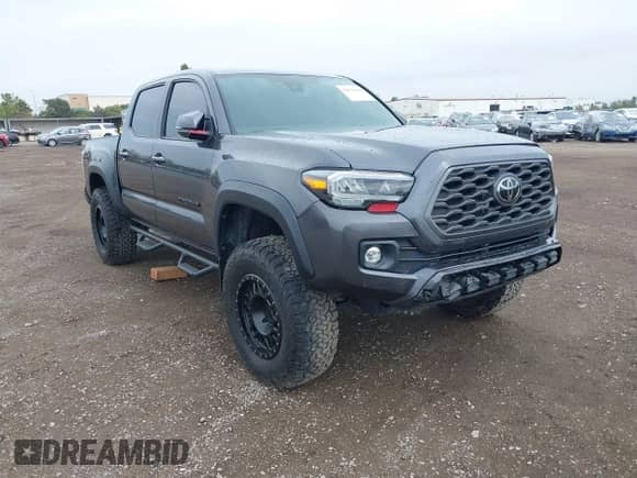 2021 Toyota Tacoma SR with VIN 3TMCZ5AN3MM450562, listed as a IAAI auction lot 43071461 with 15,850 mi miles and . Bid and sale history available at DreamBid. Image 1.