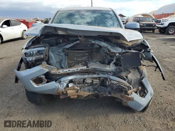 2020 Toyota Tacoma SR5 with VIN 5TFCZ5AN2LX216308, listed as a Copart auction lot 69860245 with 58,698 mi miles and Salvage title. Bid and sale history available at DreamBid. Image 5.