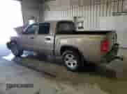 2010 Dodge Dakota Bighorn/Lonestar z VIN 1D7CW3GK2AS105977, wystawiony jako Copart lot #57417375 z przebiegiem 104 203 mil mil oraz Szkoda całkowita • Salvage title. Historia ofert i sprzedaży dostępna na DreamBid. Obrazek 2.
