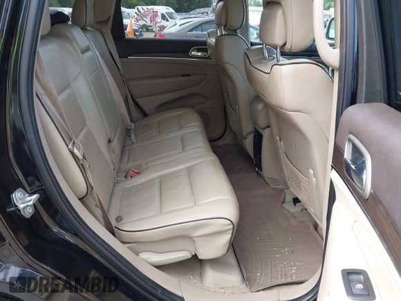 2017 Jeep Grand Cherokee Overland with VIN 1C4RJFCG4HC702073, listed as a IAAI auction lot 43110118 with 130,079 mi miles and . Bid and sale history available at DreamBid. Image 8.