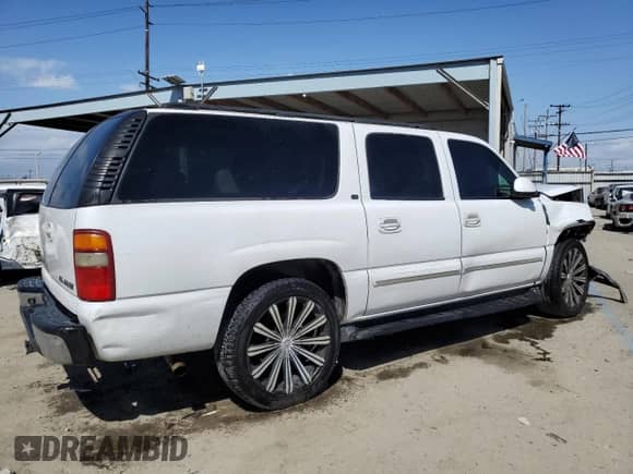 2003 Chevrolet Suburban LT с VIN 3GNEC16T73G246667, выставлен на аукционе Copart как лот 50145264 с пробегом 251 057 миль миль и Списание • Salvage title. История ставок и продаж доступна на DreamBid. Изображение 3.