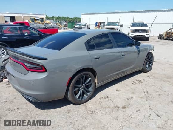 2018 Dodge Charger SXT Plus with VIN 2C3CDXHG1JH167383, listed as a IAAI auction lot 42826149 with 122,871 mi miles and . Bid and sale history available at DreamBid. Image 4.