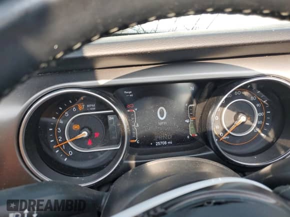 2021 Jeep Wrangler Unlimited 80th Anniversary с VIN 1C4HJXDG4MW794519, выставлен на аукционе Copart как лот 60116105 с пробегом 25 708 миль миль и Списание • Salvage title. История ставок и продаж доступна на DreamBid. Изображение 9.