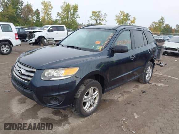 2012 Hyundai Santa Fe GLS с VIN 5XYZGDAB6CG126033, выставлен на аукционе IAAI как лот 43261351 с пробегом 166 055 миль миль и . История ставок и продаж доступна на DreamBid. Изображение 17.