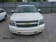 2014 Chevrolet Suburban LTZ with VIN 1GNSKKE79ER218727, listed as a IAAI auction lot 42761610 with 242,771 mi miles and . Bid and sale history available at DreamBid. Image 13.