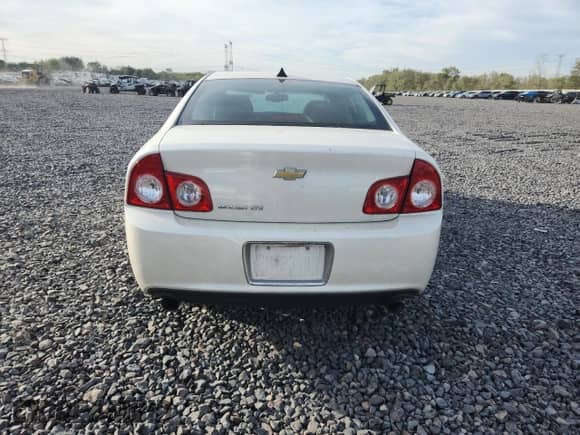 2012 Chevrolet Malibu LTZ z VIN 1G1ZG5E74CF284815, wystawiony jako Copart lot #81940285 z przebiegiem 119 577 mil mil oraz Szkoda całkowita • Salvage title. Historia ofert i sprzedaży dostępna na DreamBid. Obrazek 6.