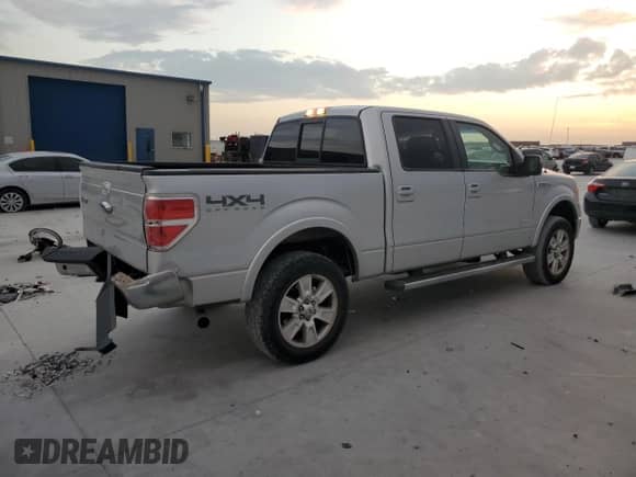 2012 Ford F-150 Lariat with VIN 1FTFW1ET0CFB34252, listed as a Copart auction lot 82726885 with 210,606 mi miles and Salvage title. Bid and sale history available at DreamBid. Image 3.