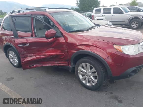 2012 Subaru Forester X Limited z VIN JF2SHBEC8CH455394, wystawiony jako IAAI lot #42730885 z przebiegiem 140 778 mil mil oraz . Historia ofert i sprzedaży dostępna na DreamBid. Obrazek 1.