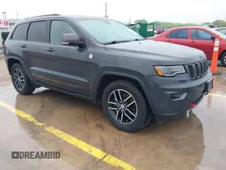 2018 Jeep Grand Cherokee Trailhawk z VIN 1C4RJFLG6JC320763, wystawiony jako IAAI lot #41871683 z przebiegiem 115 417 mil mil oraz . Historia ofert i sprzedaży dostępna na DreamBid. Obrazek 1.