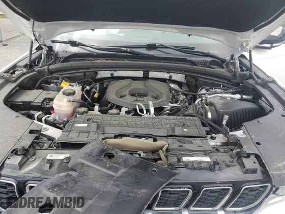 2022 Jeep Grand Cherokee with VIN 1C4RJYB65N8749633, listed as a Copart auction lot 51568275 with 27,913 mi miles and Salvage title. Bid and sale history available at DreamBid. Image 12.