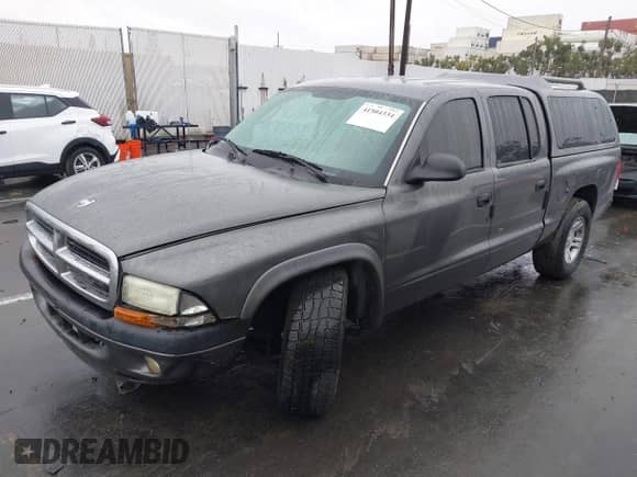2004 Dodge Dakota Sport z VIN 1D7HL38N94S651302, wystawiony jako IAAI lot #41504334 z przebiegiem Nie podano mil oraz . Historia ofert i sprzedaży dostępna na DreamBid. Obrazek 2.