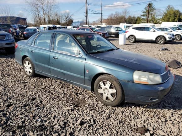 2004 Saturn L L300 1 with VIN 1G8JC54F24Y501352, listed as a Copart auction lot 82625004 with 119,175 mi miles and Salvage title. Bid and sale history available at DreamBid. Image 4.