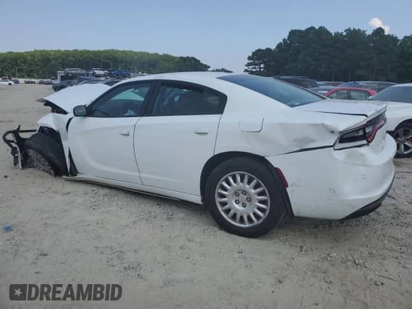 2021 Dodge Charger Police with VIN 2C3CDXKG7MH657260, listed as a Copart auction lot 60485215 with Not provided miles and Salvage title. Bid and sale history available at DreamBid. Image 2.