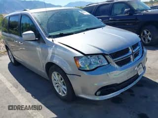2018 Dodge Grand Caravan SXT with VIN 2C4RDGCG5JR207861, listed as a IAAI auction lot 42955827 with 125,357 mi miles and . Bid and sale history available at DreamBid. Image 1.