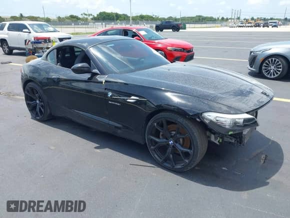 2013 BMW Z4 sDrive28i with VIN WBALL5C54DJ103959, listed as a IAAI auction lot 42371850 with 100,953 mi miles and . Bid and sale history available at DreamBid. Image 1.