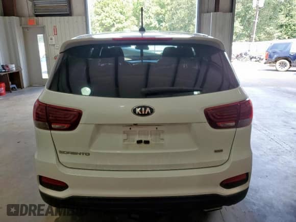 2020 Kia Sorento L z VIN 5XYPG4A34LG628524, wystawiony jako Copart lot #69577255 z przebiegiem 96 281 mil mil oraz Szkoda całkowita • Salvage title. Historia ofert i sprzedaży dostępna na DreamBid. Obrazek 6.