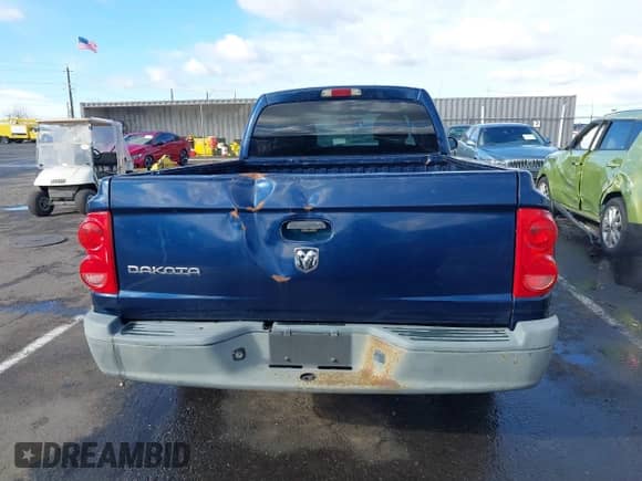 2005 Dodge Dakota ST with VIN 1D7HW22K75S294445, listed as a IAAI auction lot 41527655 with 112,155 mi miles and . Bid and sale history available at DreamBid. Image 16.