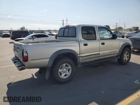 2001 Toyota Tacoma PreRunner с VIN 5TEGN92N71Z814712, выставлен на аукционе Copart как лот 65134275 с пробегом 143 238 миль миль и Списание • Salvage title. История ставок и продаж доступна на DreamBid. Изображение 3.