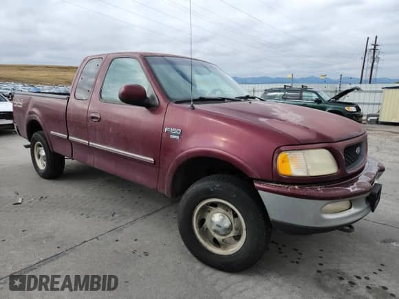 1998 Ford F-150 XL с VIN 1FTEX18L4WKA03275, выставлен на аукционе Copart как лот 84770115 с пробегом 173 880 миль миль и Чистый • Clean title. История ставок и продаж доступна на DreamBid. Изображение 4.