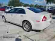 2012 Chevrolet Malibu LTZ z VIN 1G1ZG5E75CF156969, wystawiony jako IAAI lot #42576487 z przebiegiem 107 729 mil mil oraz . Historia ofert i sprzedaży dostępna na DreamBid. Obrazek 3.