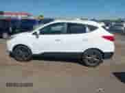 2014 Hyundai Tucson SE with VIN KM8JU3AG9EU879547, listed as a IAAI auction lot 43180093 with 151,921 mi miles and . Bid and sale history available at DreamBid. Image 14.