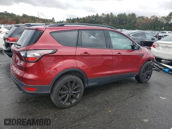 2017 Ford Escape SE with VIN 1FMCU9GD4HUE61099, listed as a Copart auction lot 86822375 with Not provided miles and Salvage title. Bid and sale history available at DreamBid. Image 3.