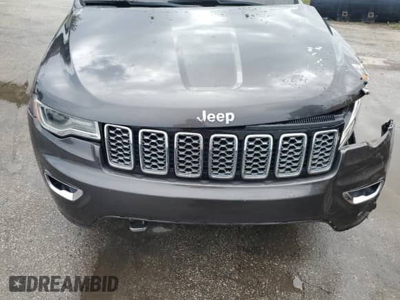 2017 Jeep Grand Cherokee Overland with VIN 1C4RJECG5HC605538, listed as a Copart auction lot 81946415 with 100,658 mi miles and Salvage title. Bid and sale history available at DreamBid. Image 12.