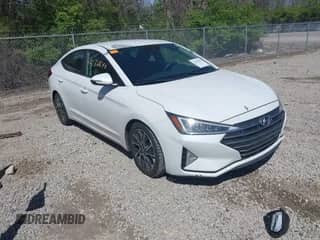 2019 Hyundai Elantra SEL z VIN 5NPD84LF7KH464281, wystawiony jako IAAI lot #42136840 z przebiegiem 90 919 mil mil oraz . Historia ofert i sprzedaży dostępna na DreamBid. Obrazek 1.