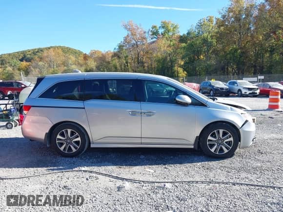 2015 Honda Odyssey Touring Elite с VIN 5FNRL5H9XFB039512, выставлен на аукционе IAAI как лот 43484728 с пробегом 122 159 миль миль и . История ставок и продаж доступна на DreamBid. Изображение 13.