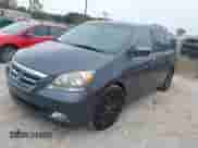 2005 Honda Odyssey Touring with VIN 5FNRL38895B006074, listed as a IAAI auction lot 43542344 with 240,192 mi miles and . Bid and sale history available at DreamBid. Image 2.