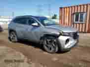 2022 Hyundai Tucson SEL Convenience with VIN KM8JFCA11NU013508, listed as a Copart auction lot 70411055 with 71,021 mi miles and Salvage title. Bid and sale history available at DreamBid. Image 4.