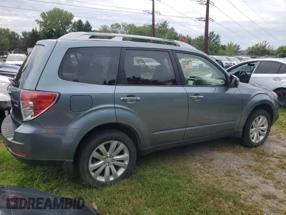 2013 Subaru Forester X Touring z VIN JF2SHAHC2DH427856, wystawiony jako Copart lot #80940655 z przebiegiem 122 842 mil mil oraz Czysty tytuł • Clean title. Historia ofert i sprzedaży dostępna na DreamBid. Obrazek 4.
