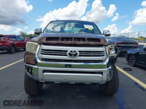 2014 Toyota Tundra 1794 Edition with VIN 5TFGY5F13EX165687, listed as a IAAI auction lot 43294453 with 126,120 mi miles and . Bid and sale history available at DreamBid. Image 12.