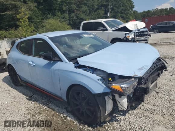 2022 Hyundai Veloster z VIN KMHT36AH7NU012198, wystawiony jako Copart lot #71785265 z przebiegiem 27 534 mil mil oraz Czysty tytuł • Clean title. Historia ofert i sprzedaży dostępna na DreamBid. Obrazek 4.