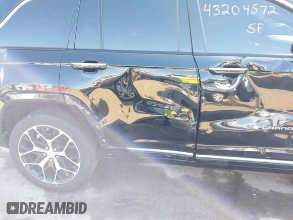 2023 Jeep Grand Cherokee Summit with VIN 1C4RJHEGXPC543650, listed as a IAAI auction lot 43204572 with 50,036 mi miles and . Bid and sale history available at DreamBid. Image 17.