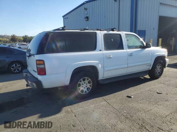 2003 Chevrolet Suburban with VIN 1GNFK16T03J134945, listed as a Copart auction lot 79855904 with Not provided miles and Salvage title. Bid and sale history available at DreamBid. Image 3.