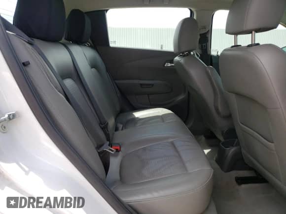 2014 Chevrolet Sonic LTZ с VIN 1G1JE6SB9E4130200, выставлен на аукционе Copart как лот 55669475 с пробегом 104 635 миль миль и Списание • Salvage title. История ставок и продаж доступна на DreamBid. Изображение 11.