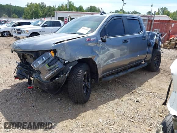 2021 Chevrolet Silverado 1500 LT Trail Boss with VIN 1GCPYFED6MZ397396, listed as a IAAI auction lot 43082878 with 77,397 mi miles and . Bid and sale history available at DreamBid. Image 2.