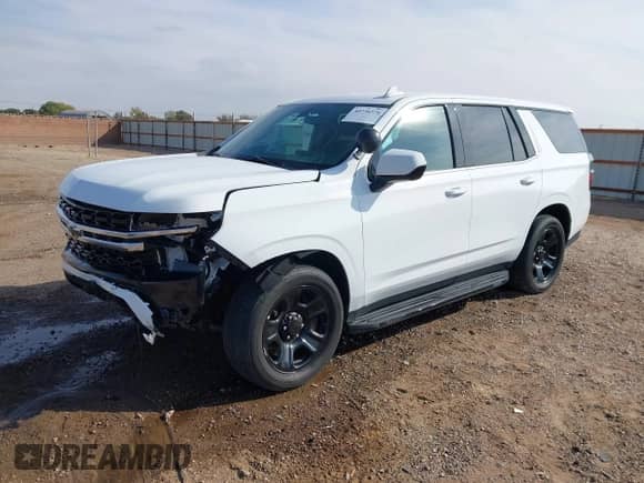2021 Chevrolet Tahoe Commercial with VIN 1GNSKLED2MR374859, listed as a IAAI auction lot 40736376 with 83,417 mi miles and . Bid and sale history available at DreamBid. Image 2.