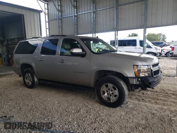 2009 Chevrolet Suburban 2LT с VIN 1GNFK26369R169036, выставлен на аукционе Copart как лот 83871775 с пробегом 253 894 миль миль и Списание • Salvage title. История ставок и продаж доступна на DreamBid. Изображение 4.
