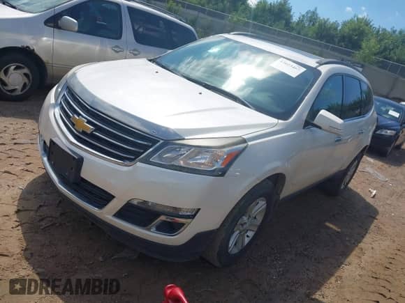 2013 Chevrolet Traverse LT with VIN 1GNKVJKD7DJ192704, listed as a IAAI auction lot 43023467 with 177,243 mi miles and . Bid and sale history available at DreamBid. Image 2.